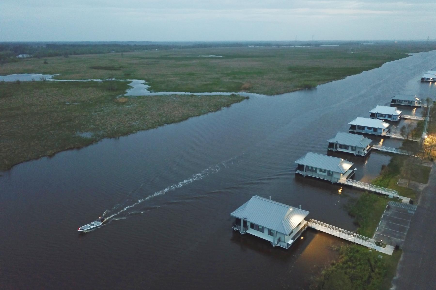 cabins at Bayou Segnette with boat