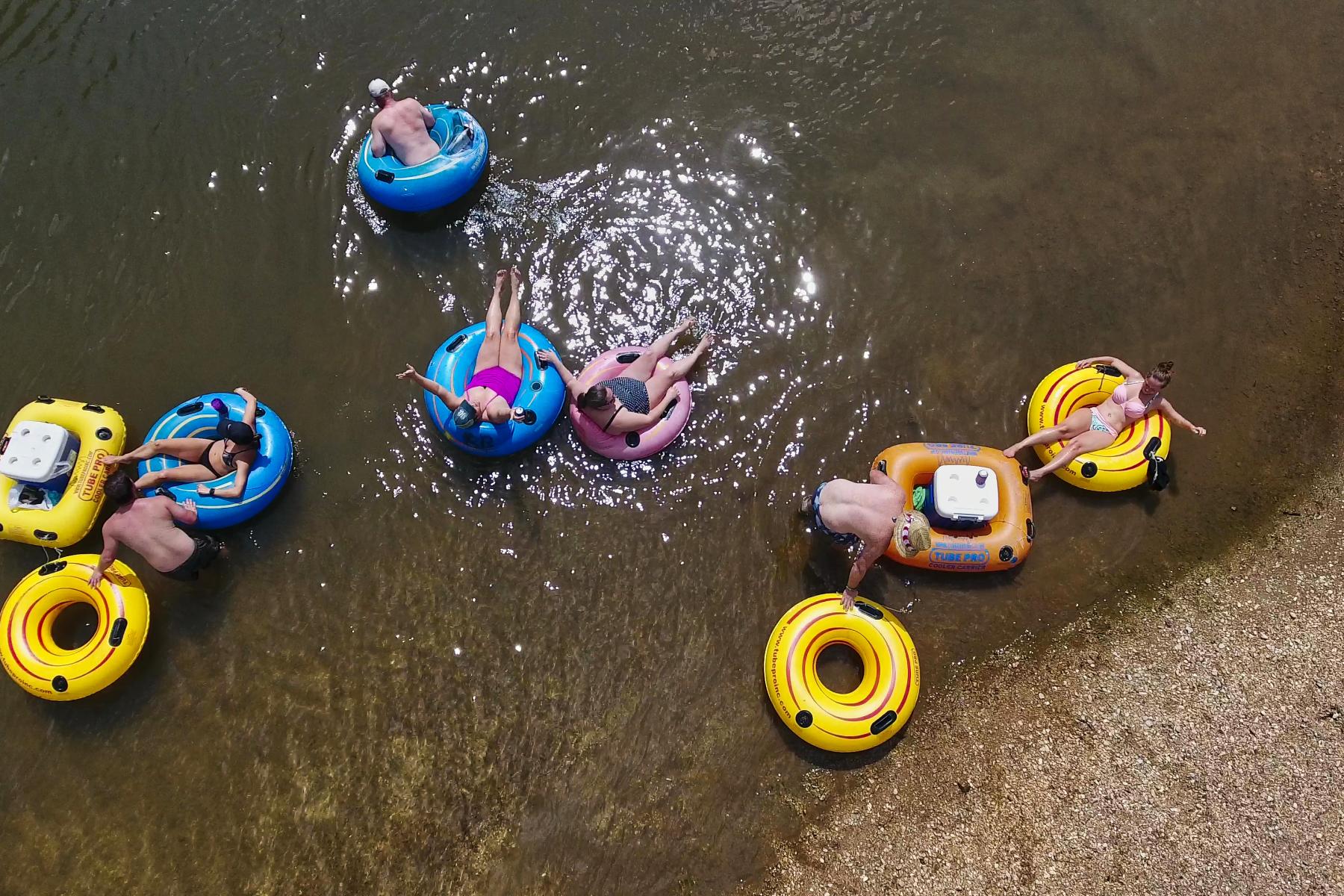 People enjoying tubing on the river at Bogue Chitto 