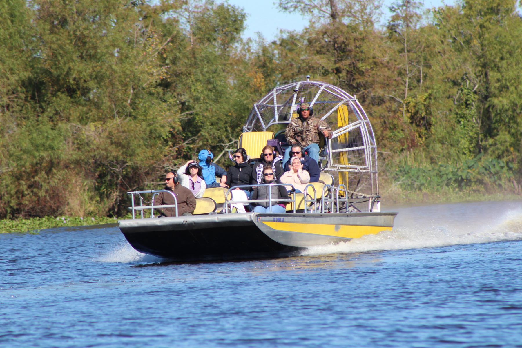 People on an airboat at Bayou Segnette