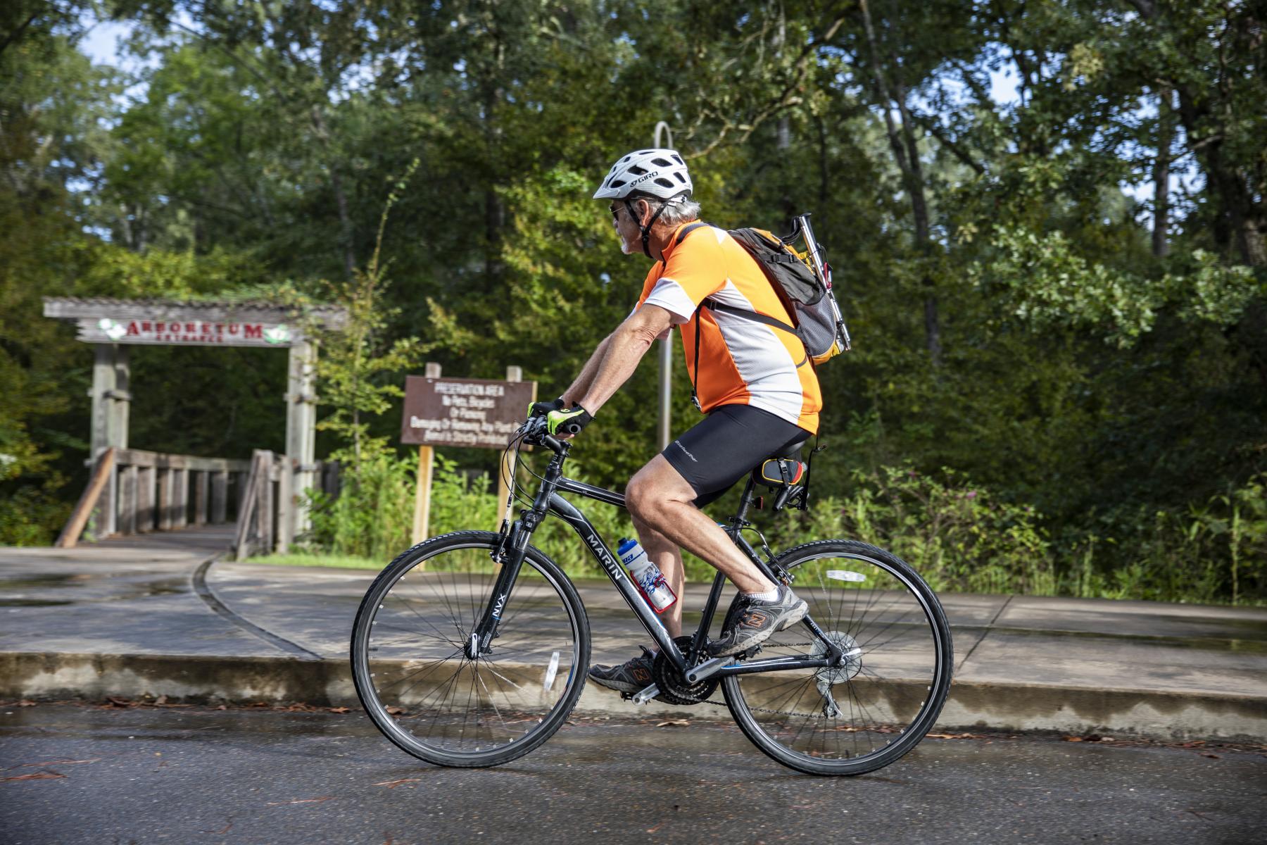 Man riding bike Chicot State Park